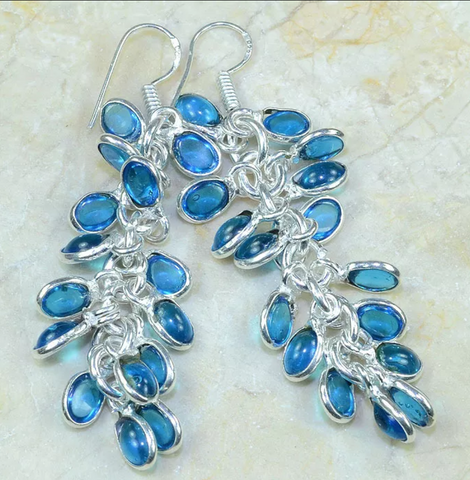 silver, blue topaz