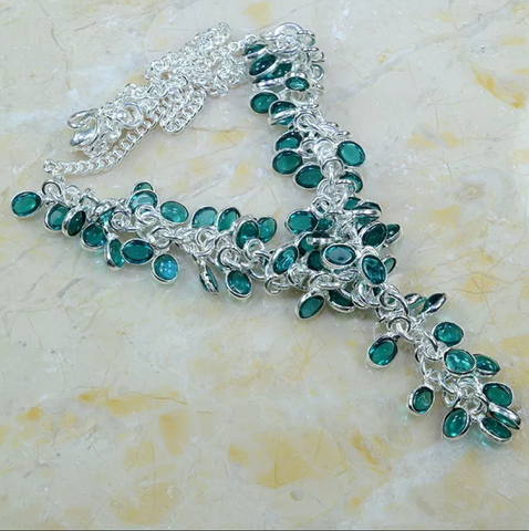 Silver, aqua green topaz