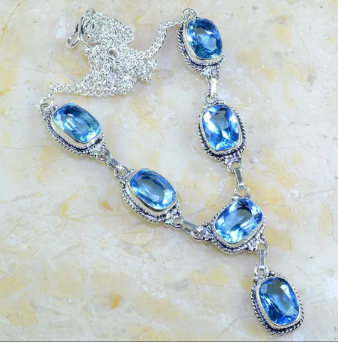 silver, blue topaz