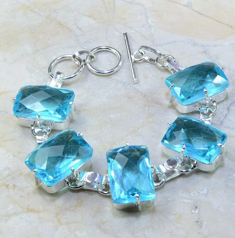 silver, blue topaz