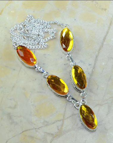 silver, yellow rainbow topaz