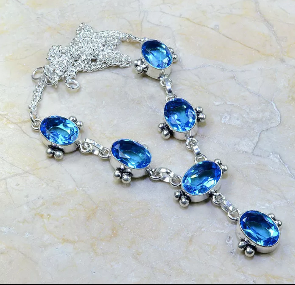 silver, blue topaz