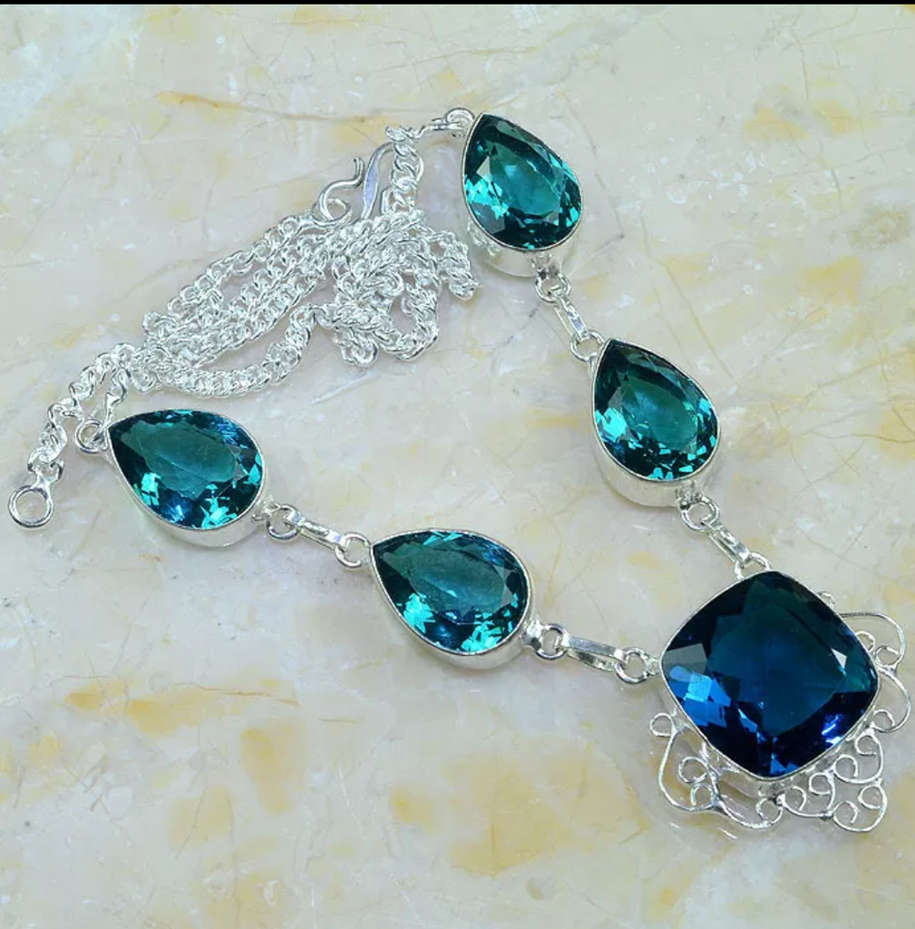 silver, green and blue topaz