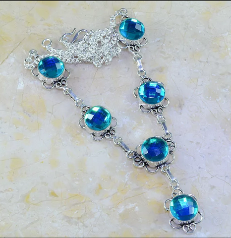 silver, blue rainbow topaz