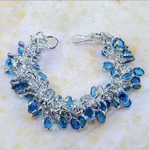 silver, blue topaz