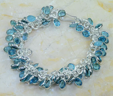 silver, blue topaz