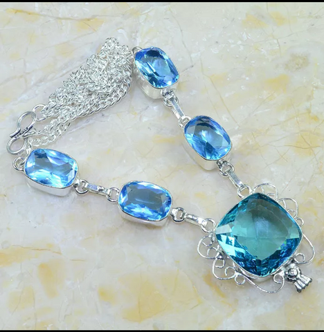 silver, blue topaz