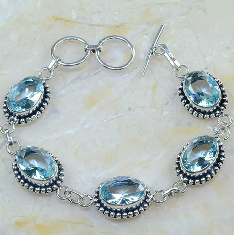 silver, blue topaz