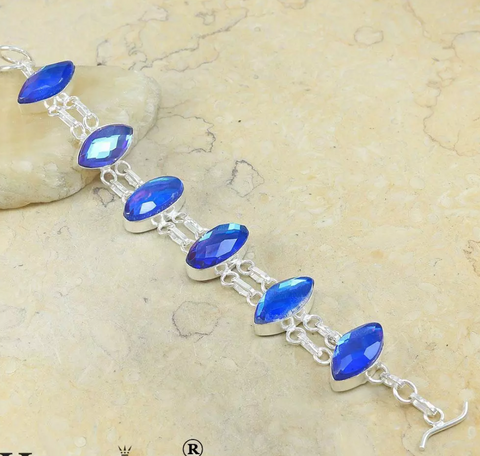 silver, blue rainbow topaz