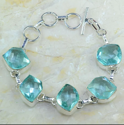 silver, blue topaz