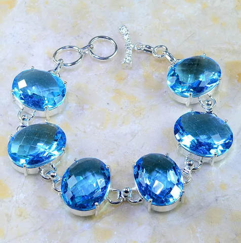 silver, blue topaz