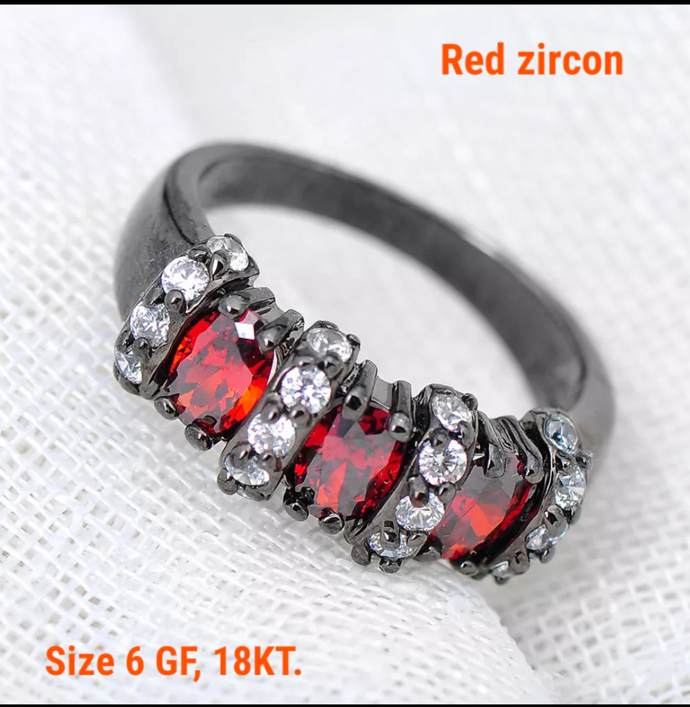 Black gold filled, red zircon, size 6