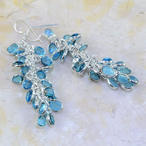 silver, blue topaz