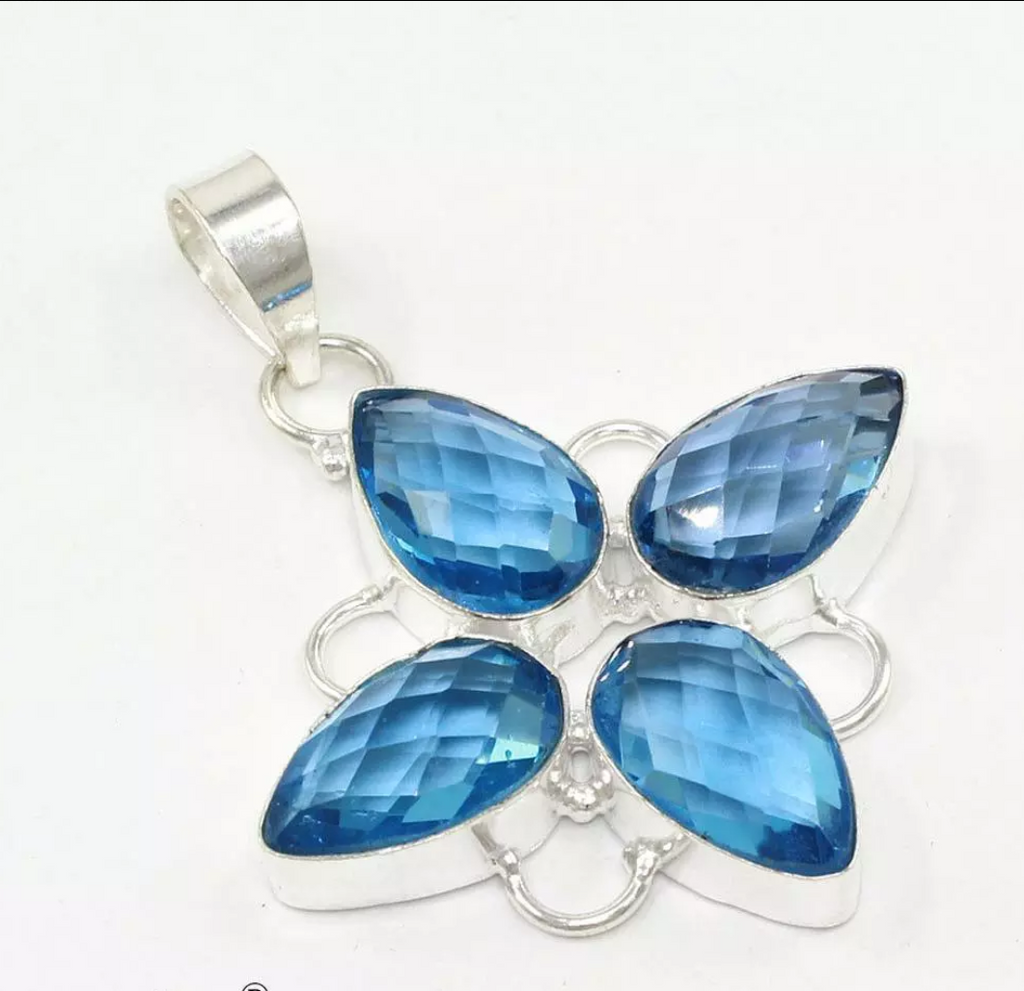 silver, blue topaz pendant witn silver chain