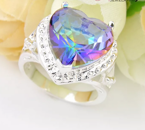 Silver rainbow topaz size 7