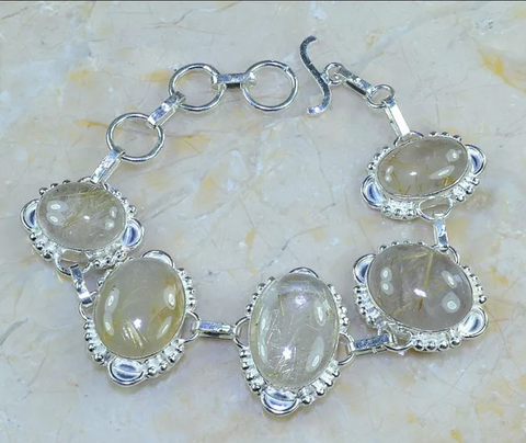 silver, rutilated quartz