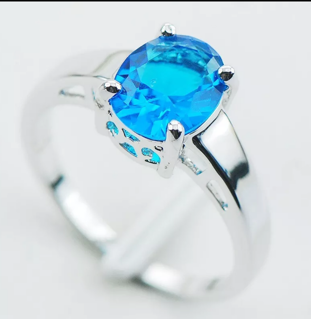 silver, blue topaz size 7