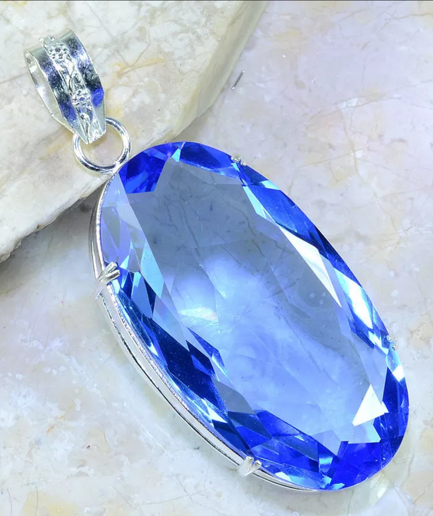 Silver, blue topaz pendant