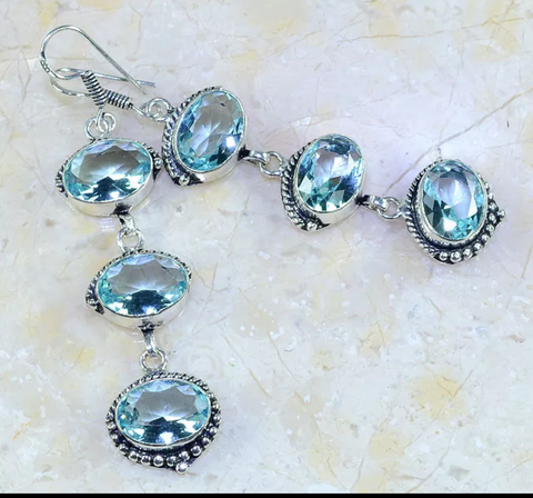 Silver, blue topaz earrings