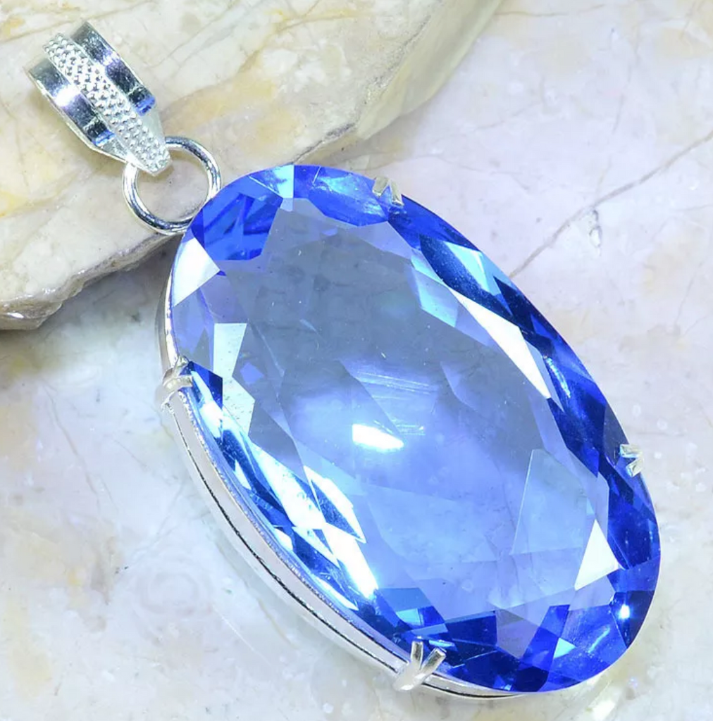 Silver, blue iolite pendant