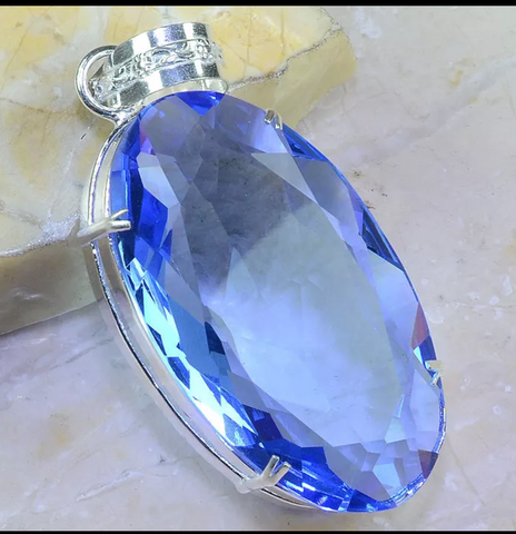 Silver, iolite blue pendant