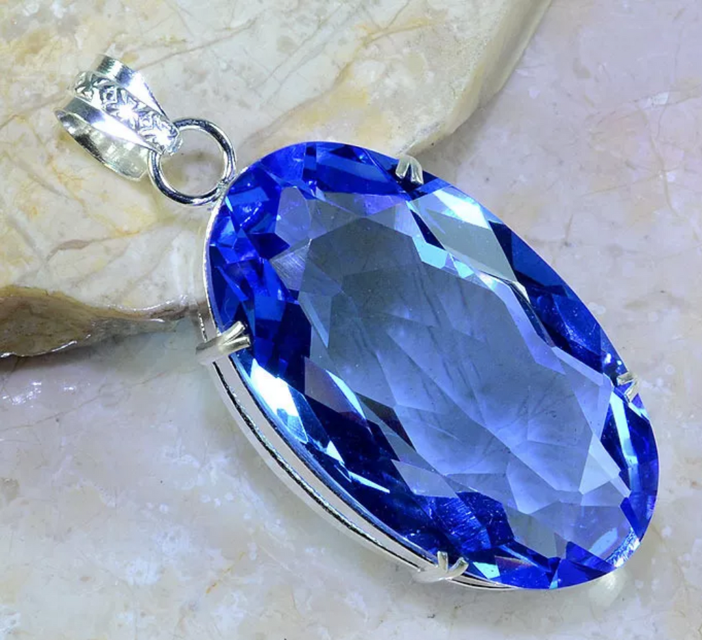 Silver, blue iolite pendant
