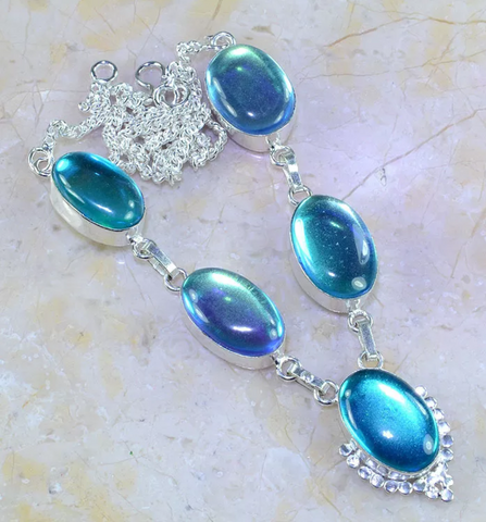 Silver, blue rainbow topaz