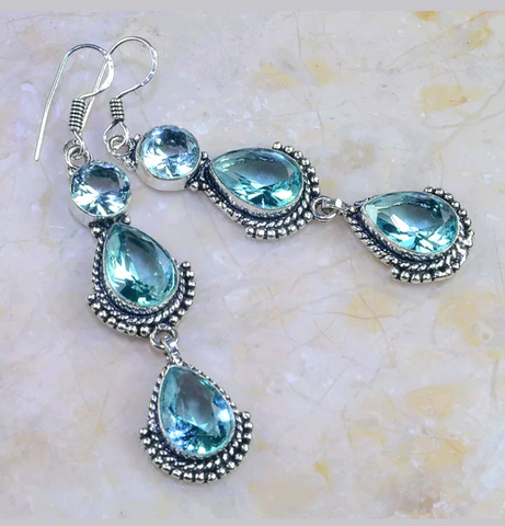 Silver, blue topaz earrings