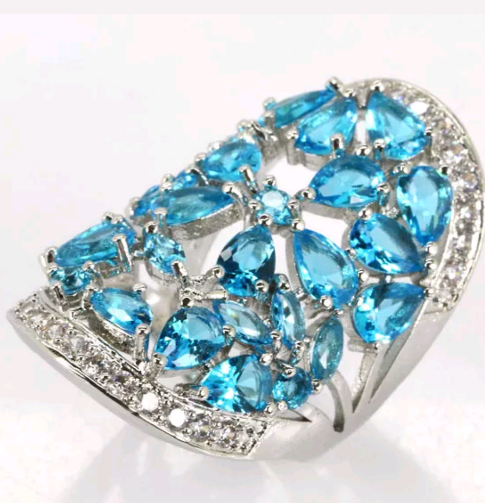 Silver, swiss blue topaz size 7