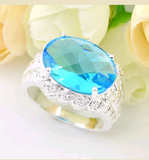 Silver, blue topaz size 7