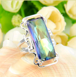 Silver, rainbow topaz size 7