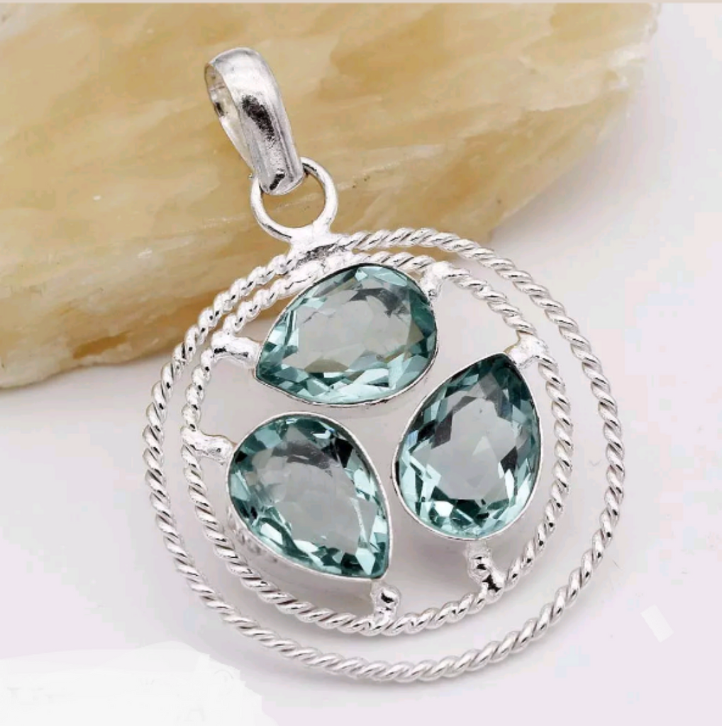 Silver, blue topaz pendant