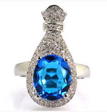 Silver, swiss blue topaz size 8