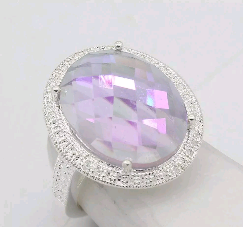 Silver, rainbow topaz size 7