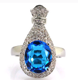 Silver, swiss blue topaz size 7.5