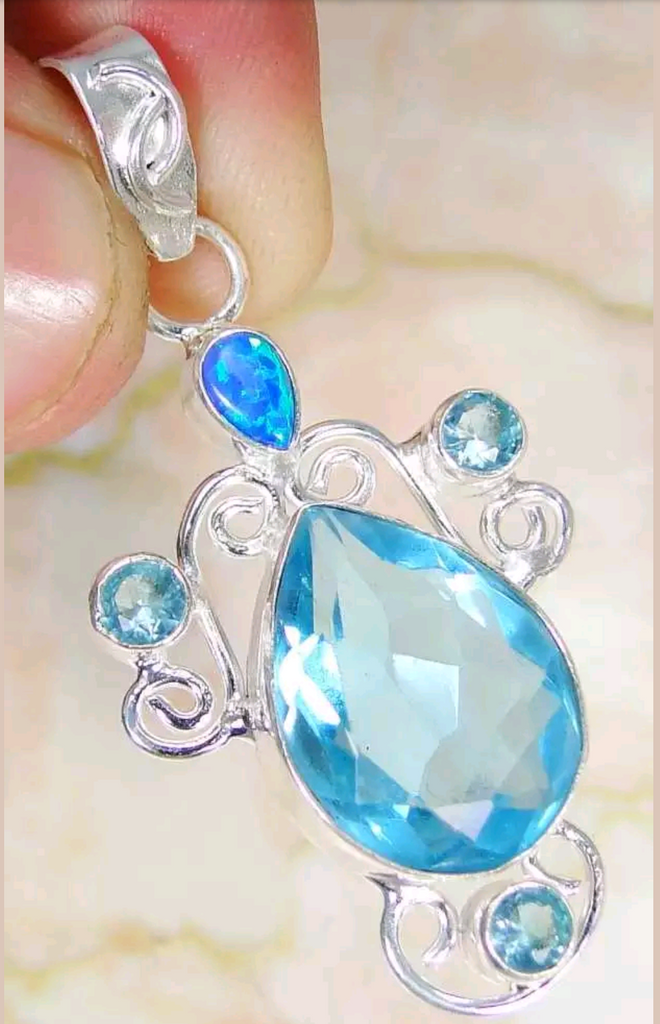 Silver, blue topaz