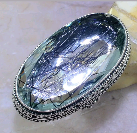 Silver, tourmalinated quartz size 7