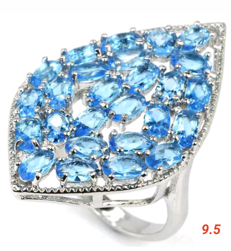 Silver, swiss blue topaz size 9.5