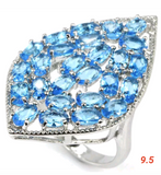 Silver, swiss blue topaz size 9.5