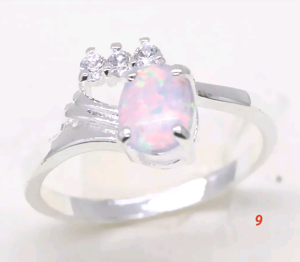 Silver, opal size 9