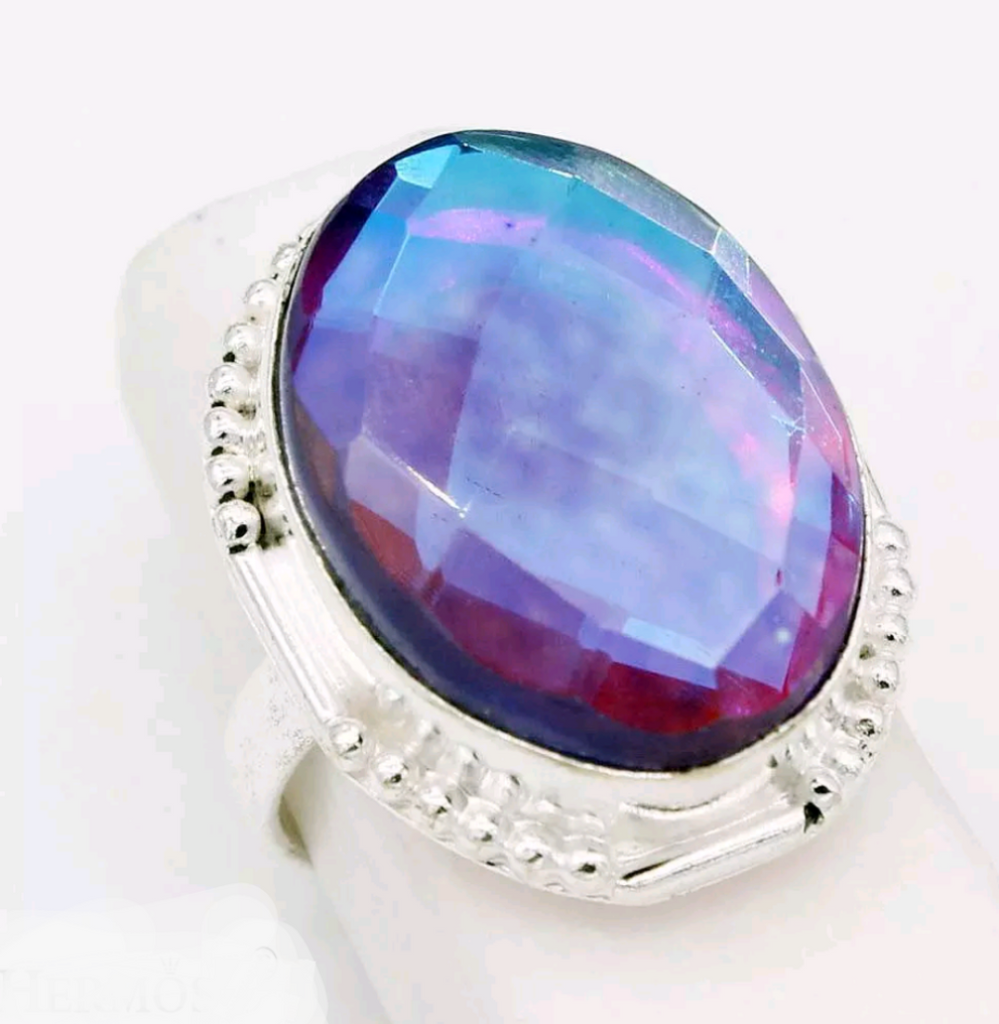Silver, rainbow topaz size 8.5