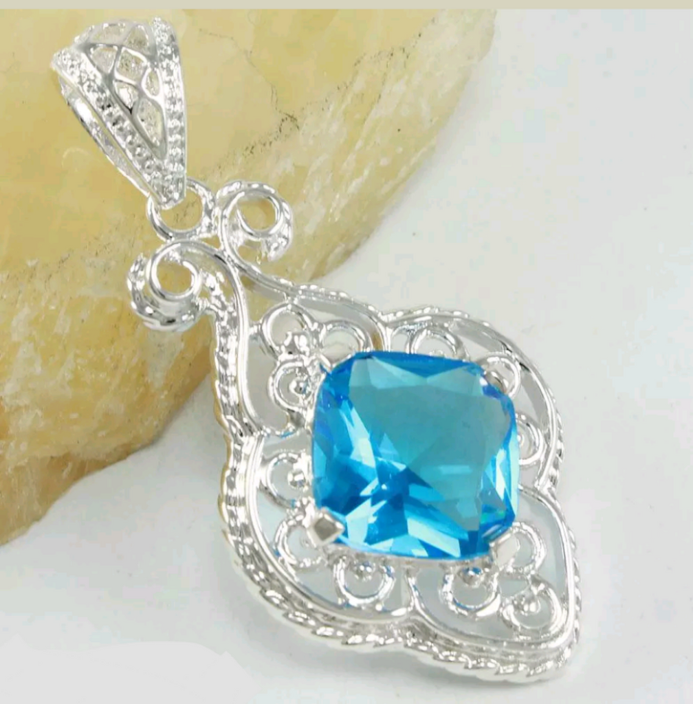 Silver, blue topaz pendant