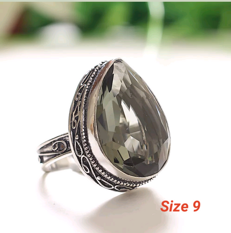 Silver, smokey topaz size 9