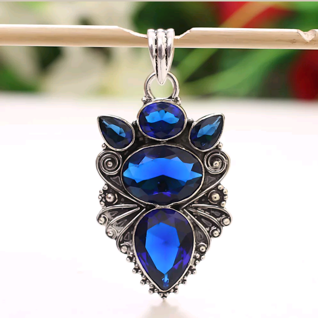 Silver, blue sapphire pendant