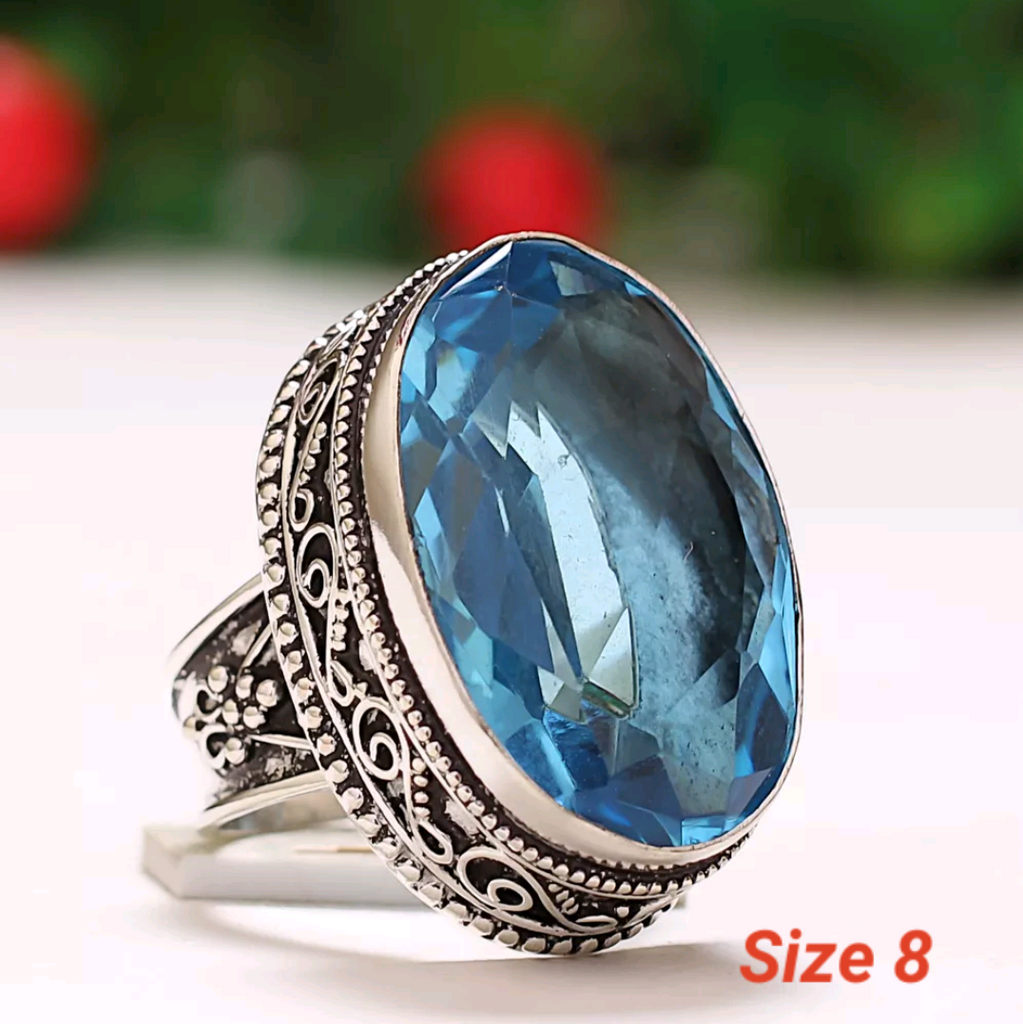 Silver, blue topaz size 8