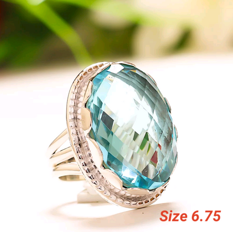 Silver, blue topaz size 6.75