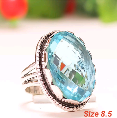 Silver, blue topaz size 8.5