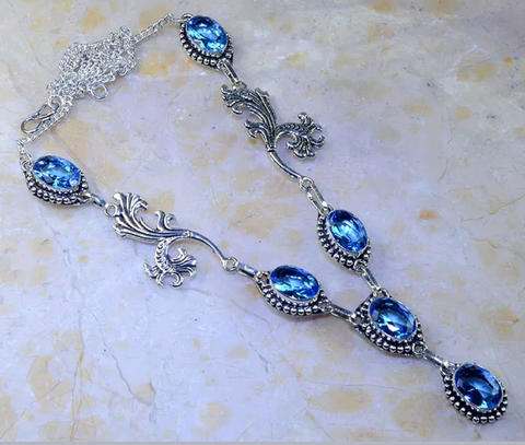 Silver, blue topaz necklace