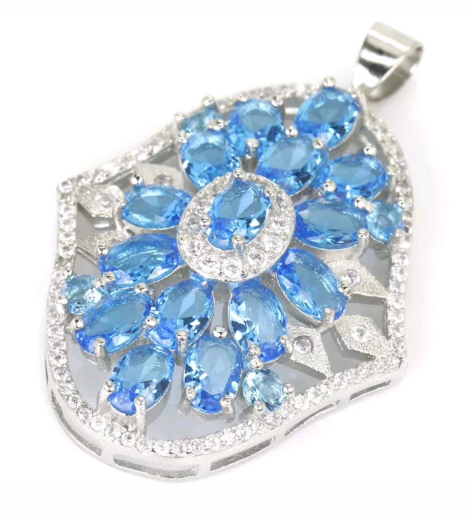 Silver. Swiss blue topaz pendant